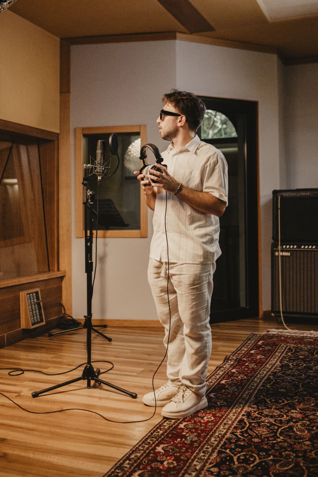Professional vocal recording session with modern production techniques